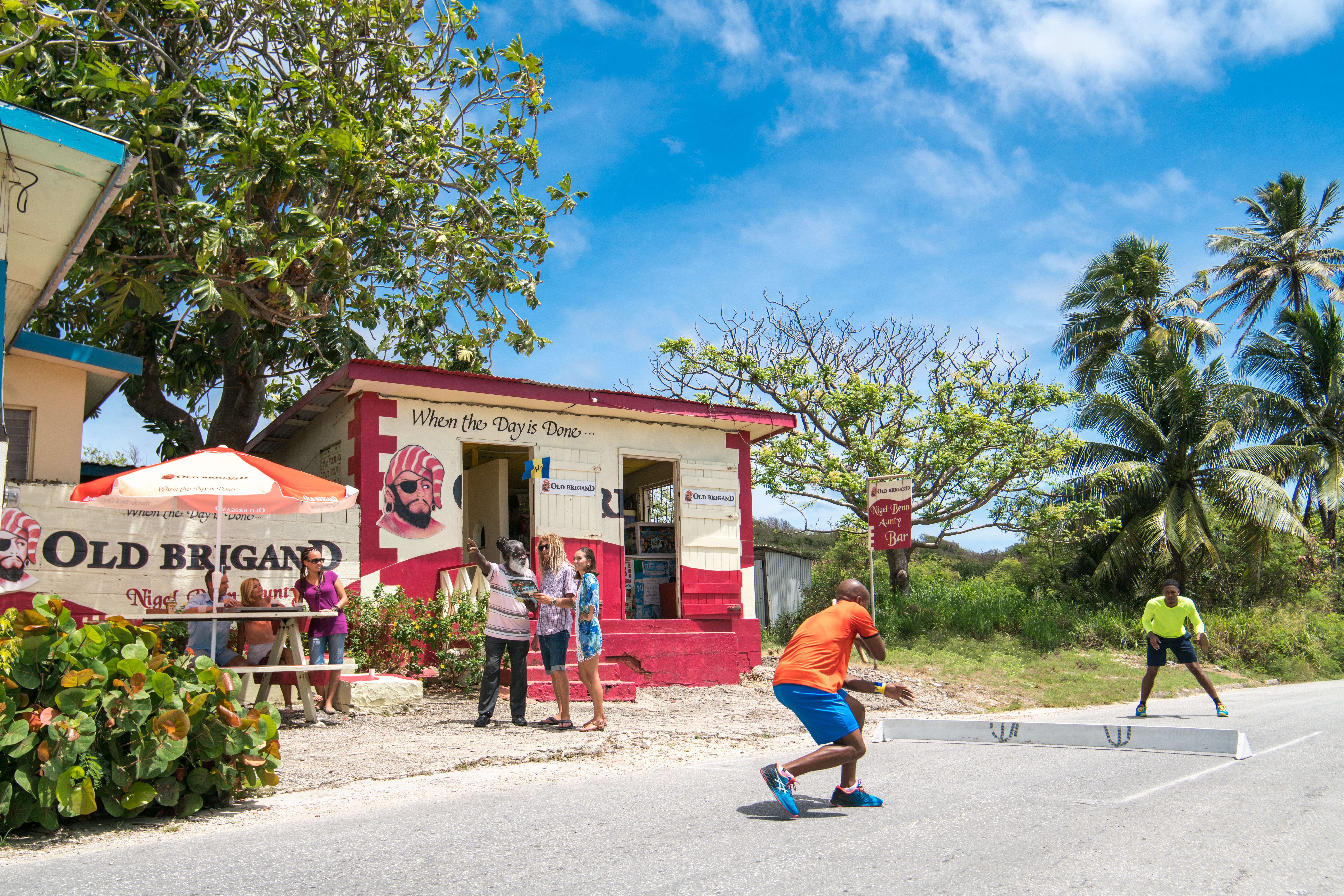 Enjoy a rum punch at one of the island’s friendly rum shops