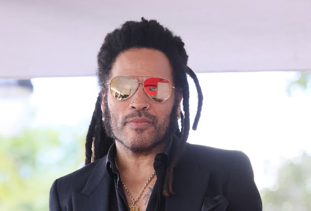 <p>Lenny Kravitz says he’s ‘always working out in leather pants’ </p>