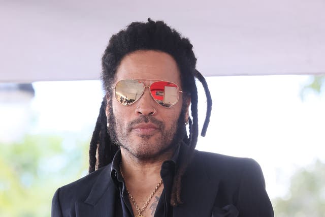 <p>Lenny Kravitz says he’s ‘always working out in leather pants’ </p>