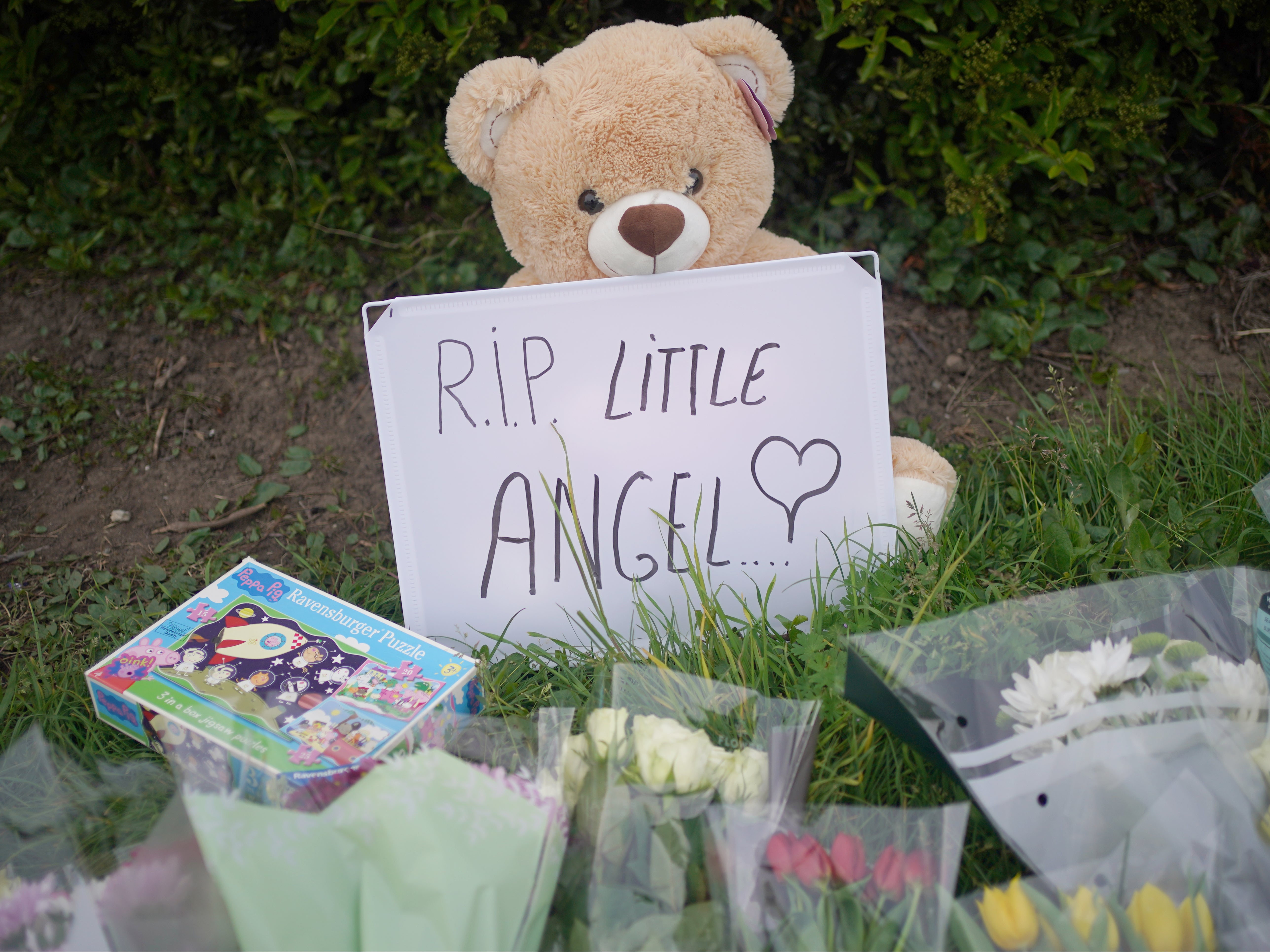 People left flowers and a teddy bear at the spot where Daniel Anjorin died