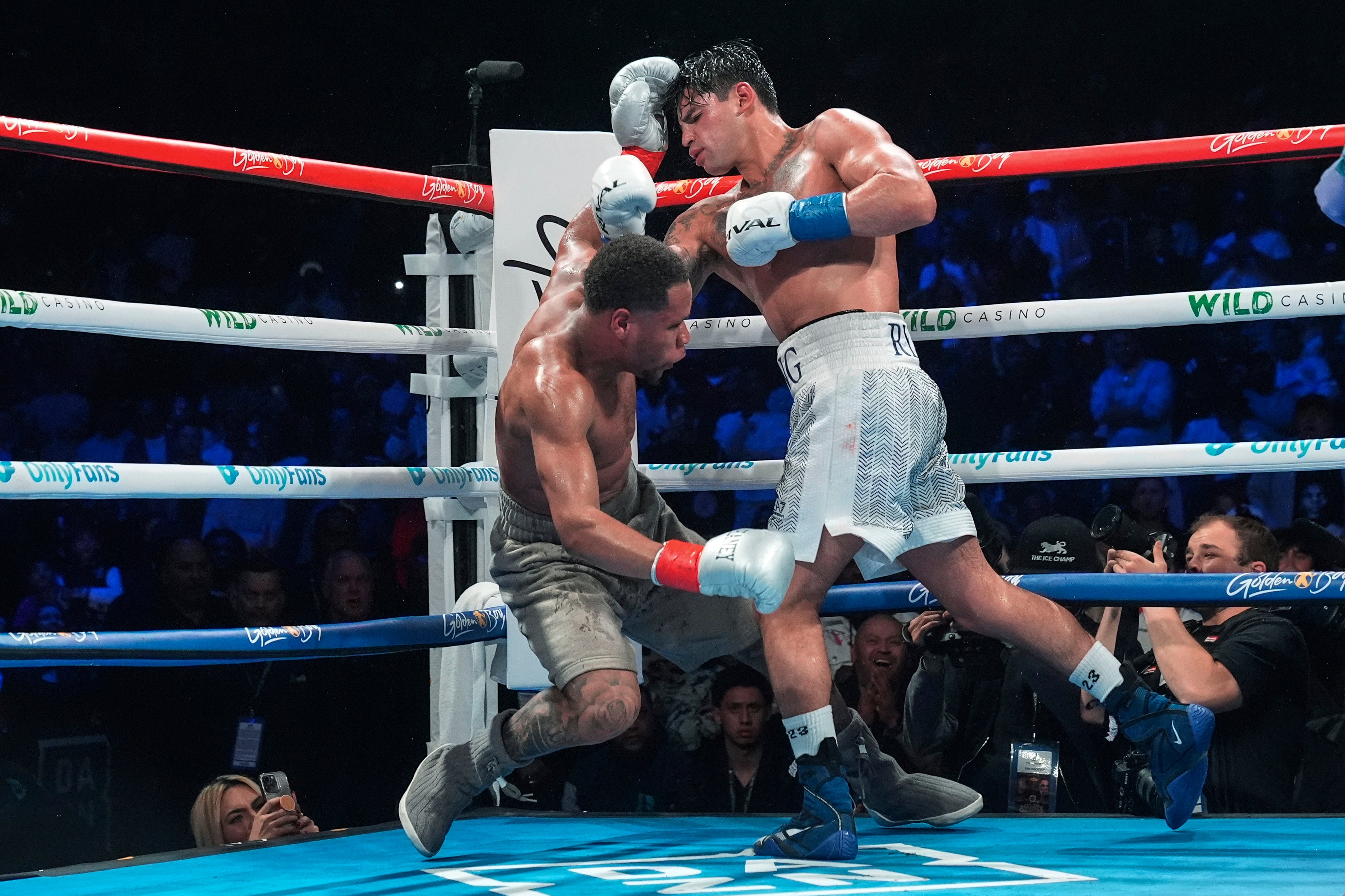Garcia (right) floored Haney three times en route to a majority-decision win