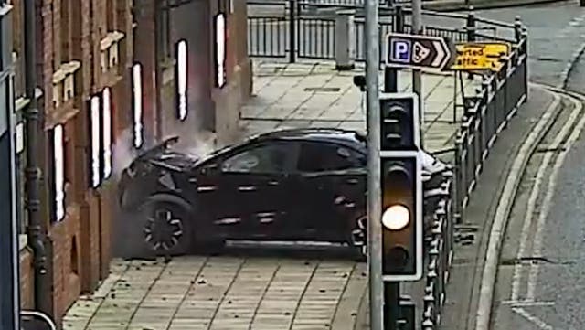<p>Moment man deliberately drives car into UK theatre during rush hour.</p>