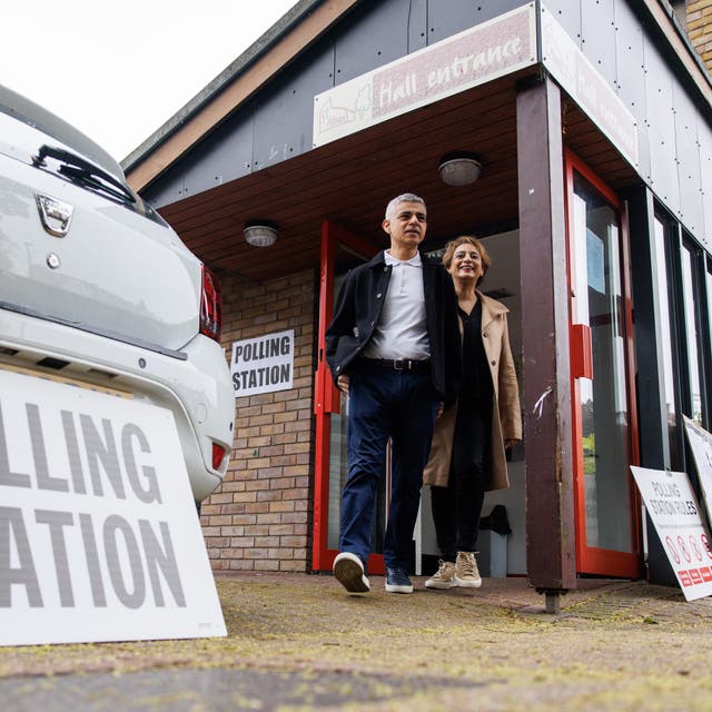 <p>Mayor of London Sadiq Khan and his wife Saadiya Khan leave their polling station</p>