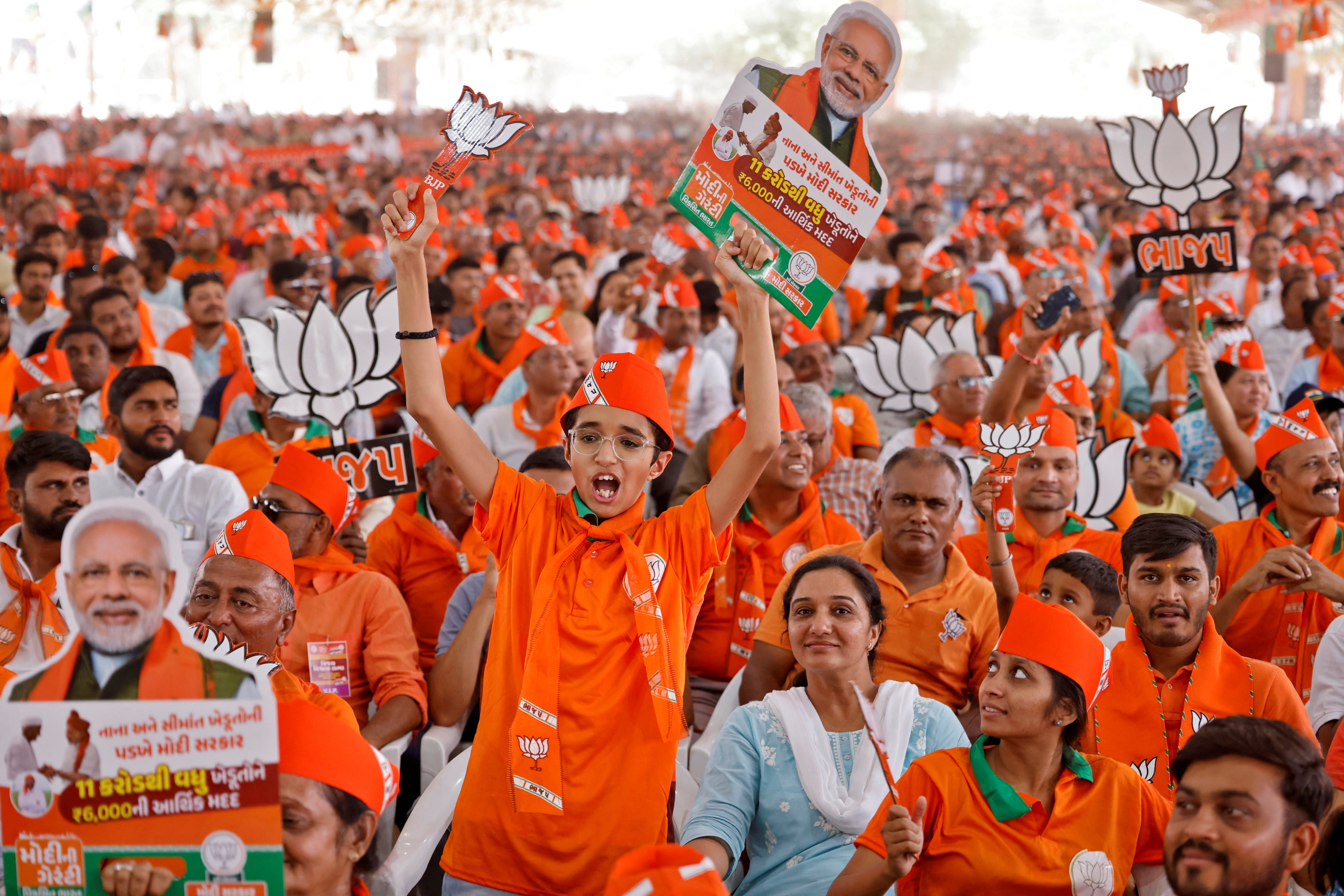Supporters of prime minister Narendra Modi during an election campaign rally in Anand, Gujarat