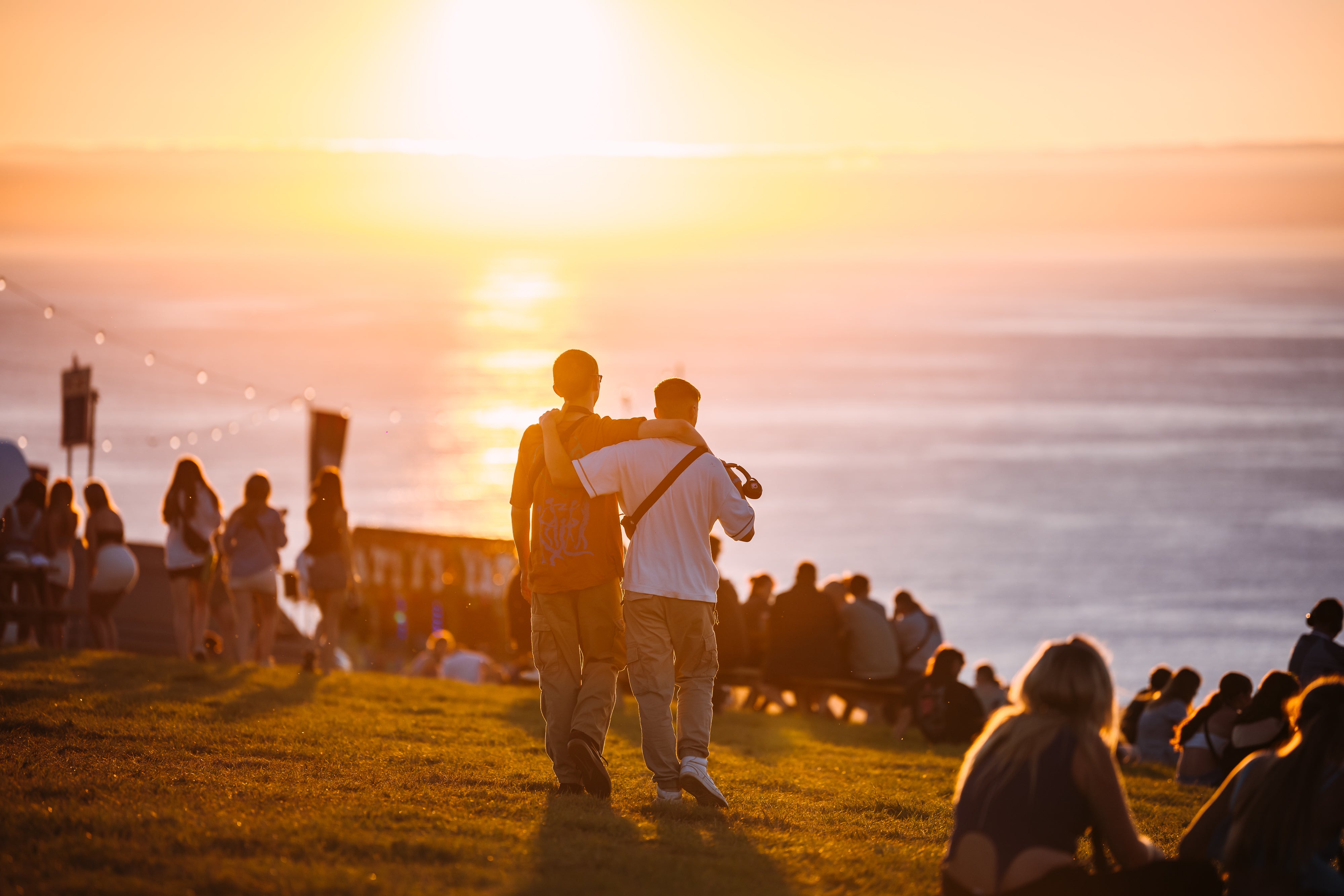 Music fans enjoy the sunset at Boardmasters in Cornwall