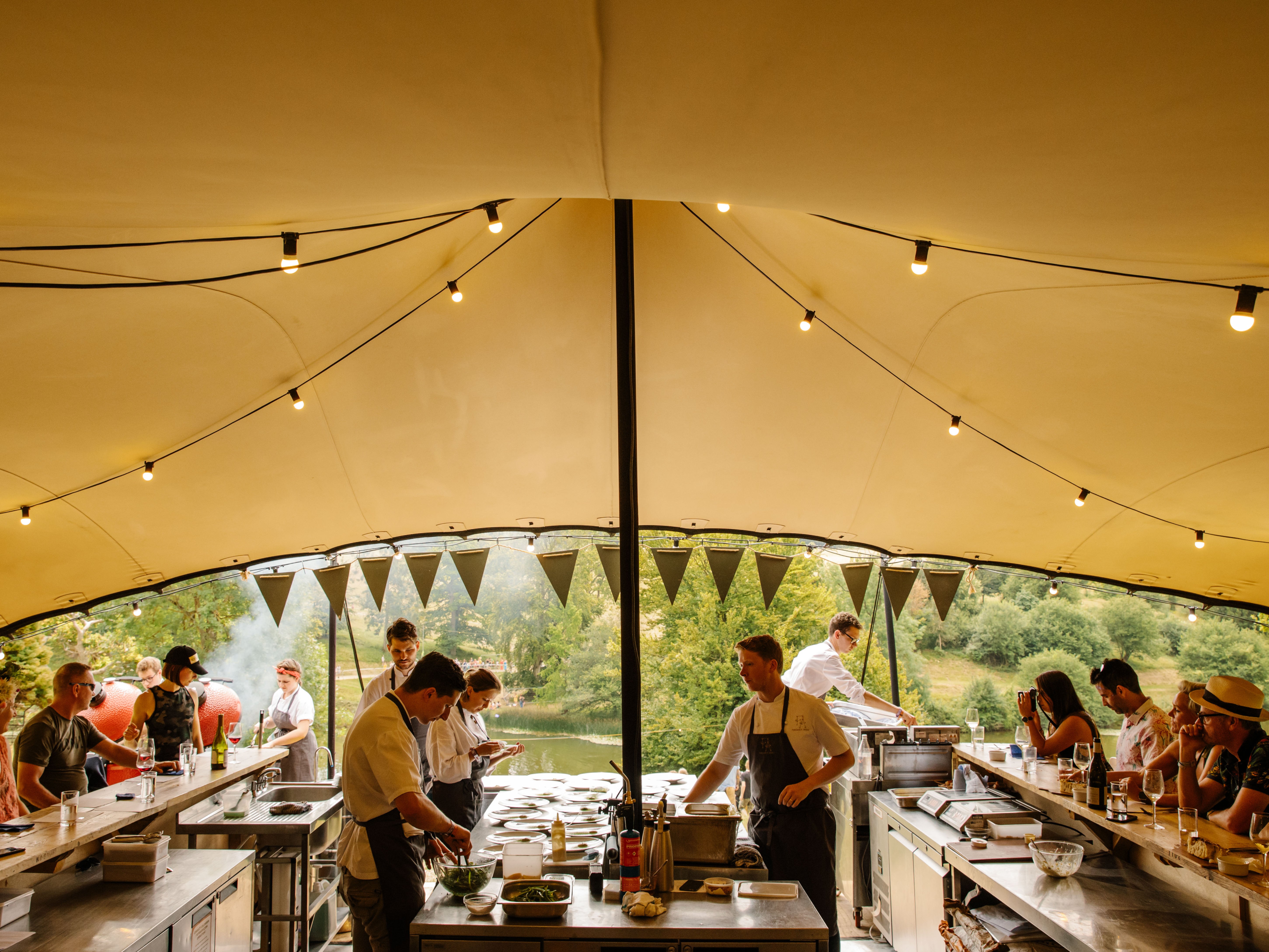 Diners enjoy a gourmet experience at Wilderness Festival