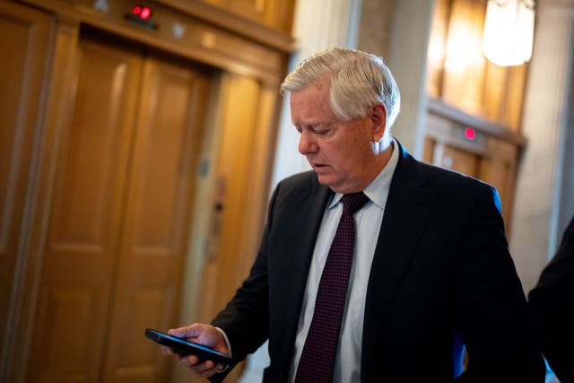 <p>Senator Lindsey Graham is pictured staring at his phone during congressional votes to pass foreign aid for Ukraine, Israel and Taiwan. The FBI recently seized his phone as part of the agency’s investigation.</p>
