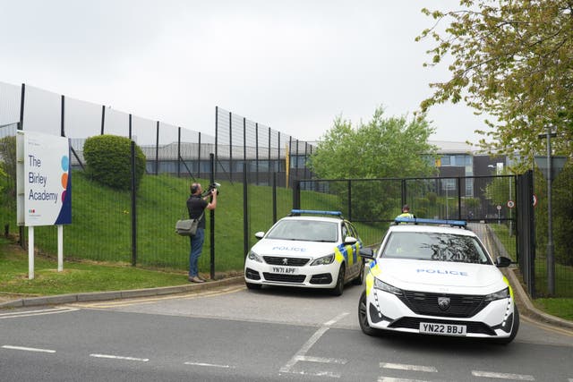 <p>Police outside the Birley Academy in Sheffield, South Yorkshire (Dominic Lipinski/PA).</p>