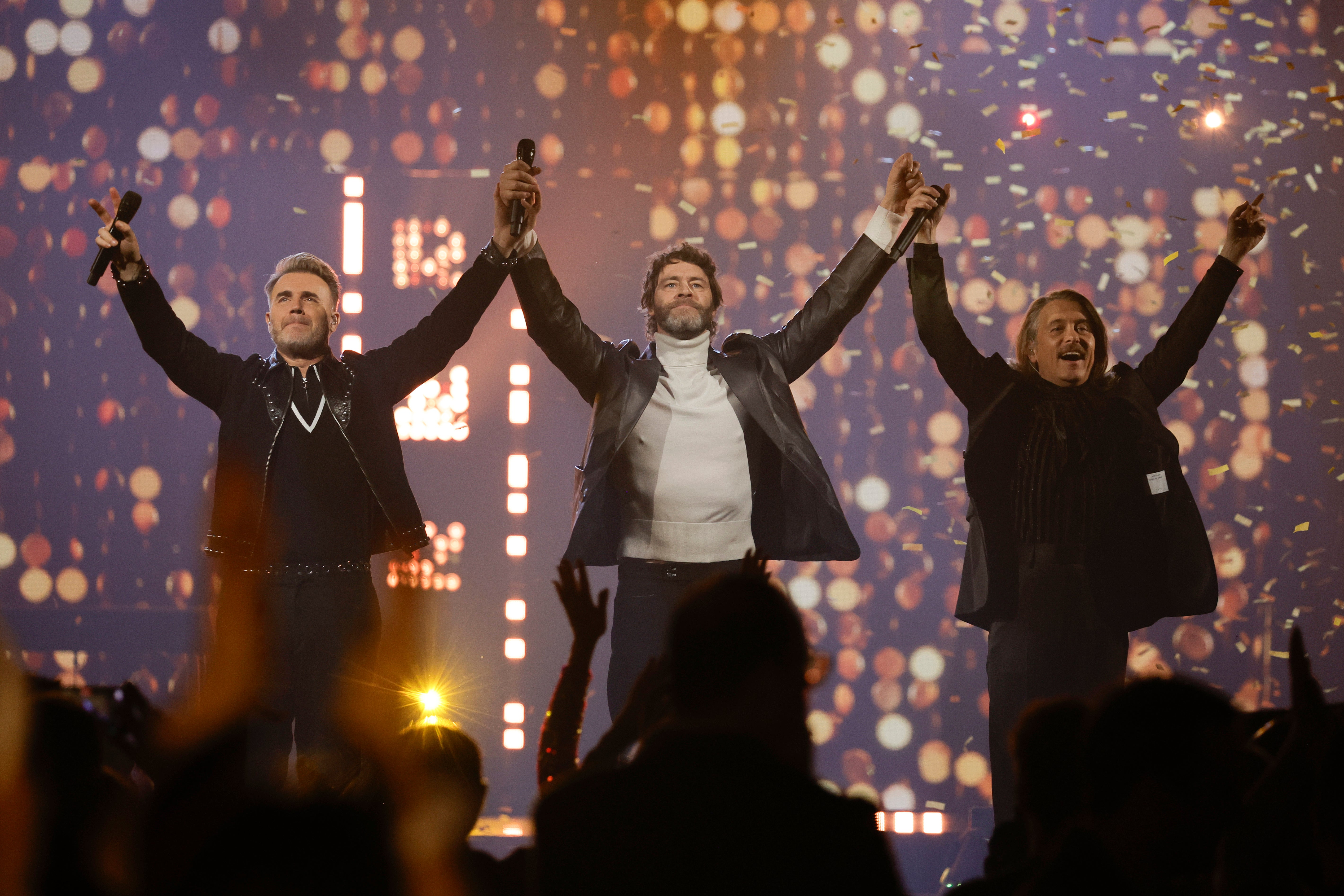 Take That perform onstage during the finale of The National Lottery's Big Bash to celebrate 2023 at OVO Arena Wembley on December 06, 2023 in London