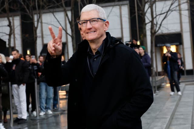 <p>Apple CEO Tim Cook arrives as people line up to purchase Apple Vision Pro headset in New York City on 2 February 2024  </p>