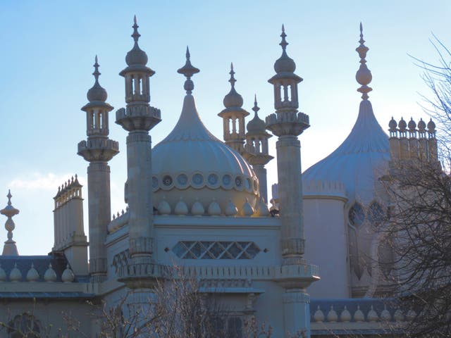 <p>Bright start: Another clear day dawns over the Royal Pavilion in Brighton</p>