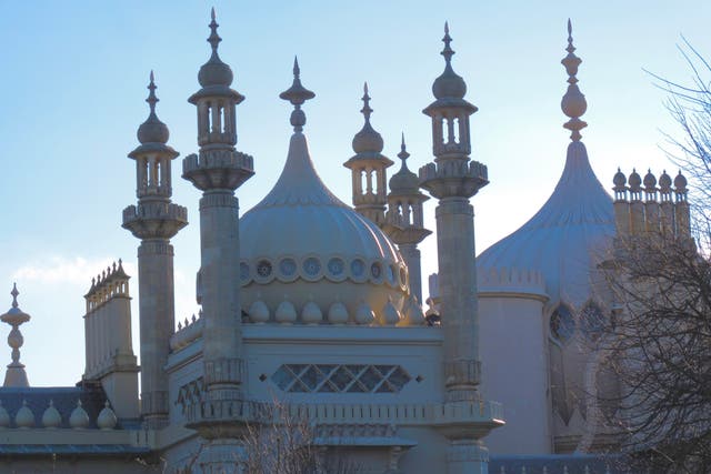 <p>Bright start: Another clear day dawns over the Royal Pavilion in Brighton</p>