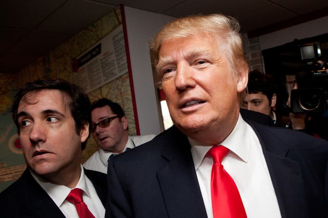 <p>Donald Trump arrives at the Roundabout Diner in 2011 with Michael Cohen in Portsmouth, New Hampshire</p>