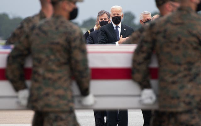 <p>US President Joe Biden(C) attends the dignified transfer of the remains of fallen service members at Dover Air Force Base in Dover, Delaware, August, 29, 2021, after 13 members of the US military were killed</p>