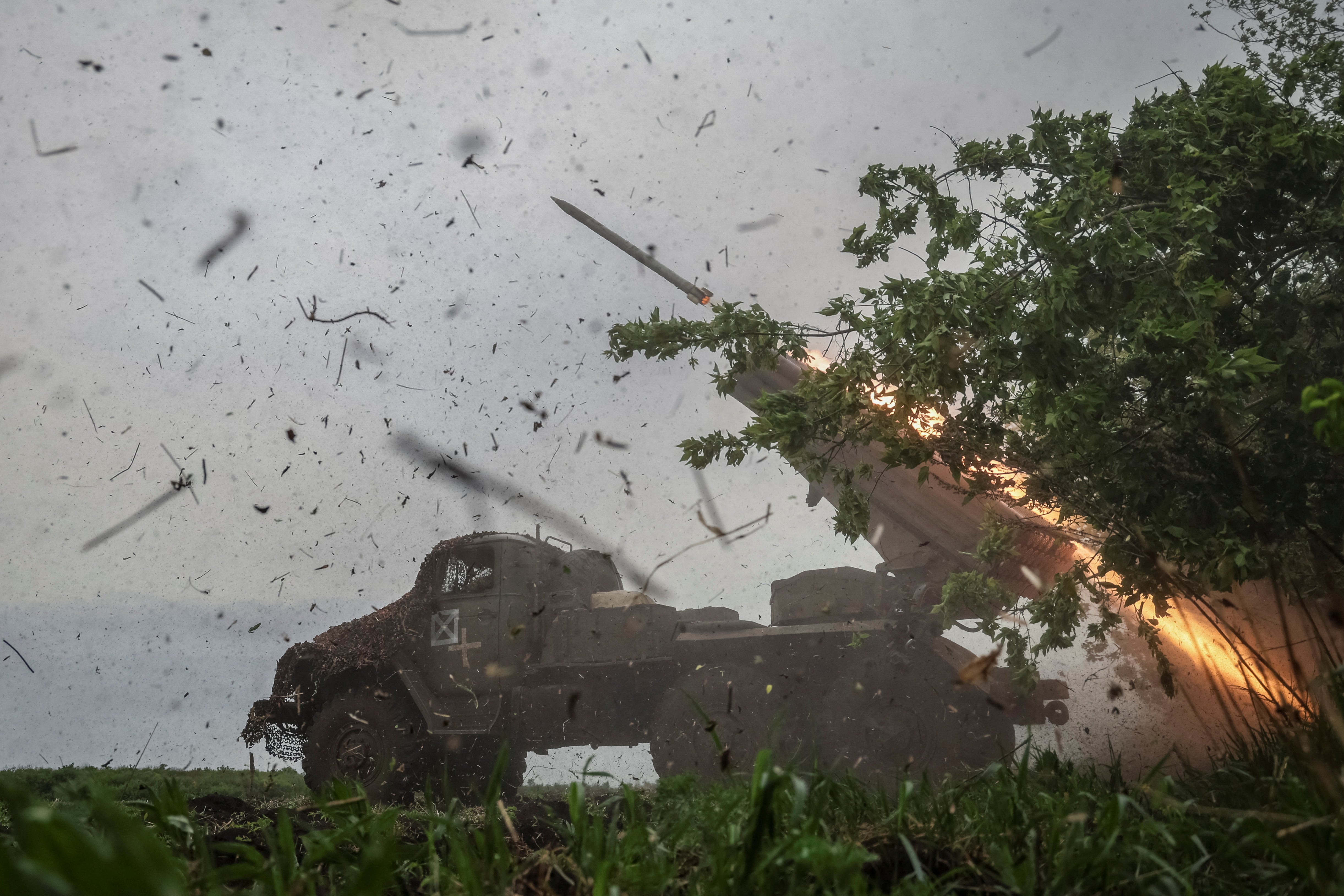 Ukrainian troops fire a rocket at Russian forces in the Donetsk region