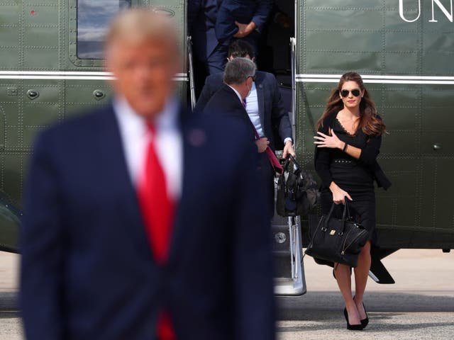 <p>Hope Hicks, pictured here with then-President Donald Trump on 23 October 2020, is testifying in his criminal trial today </p>