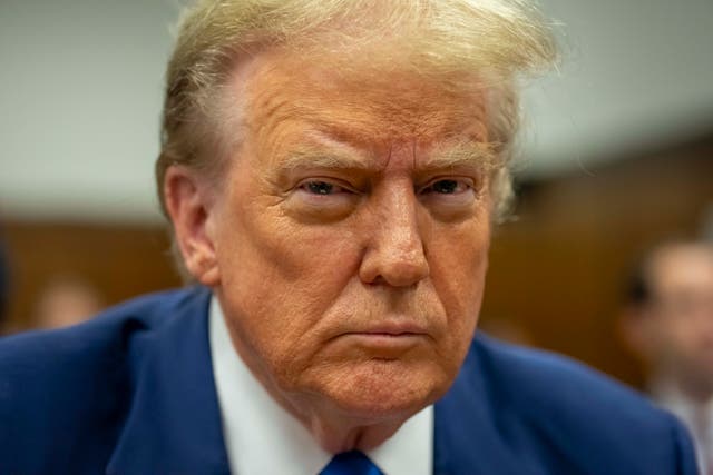 <p>Former U.S. President Donald Trump attends his trial for allegedly covering up hush money payments at Manhattan Criminal Court on 3 May 2024 in New York City</p>