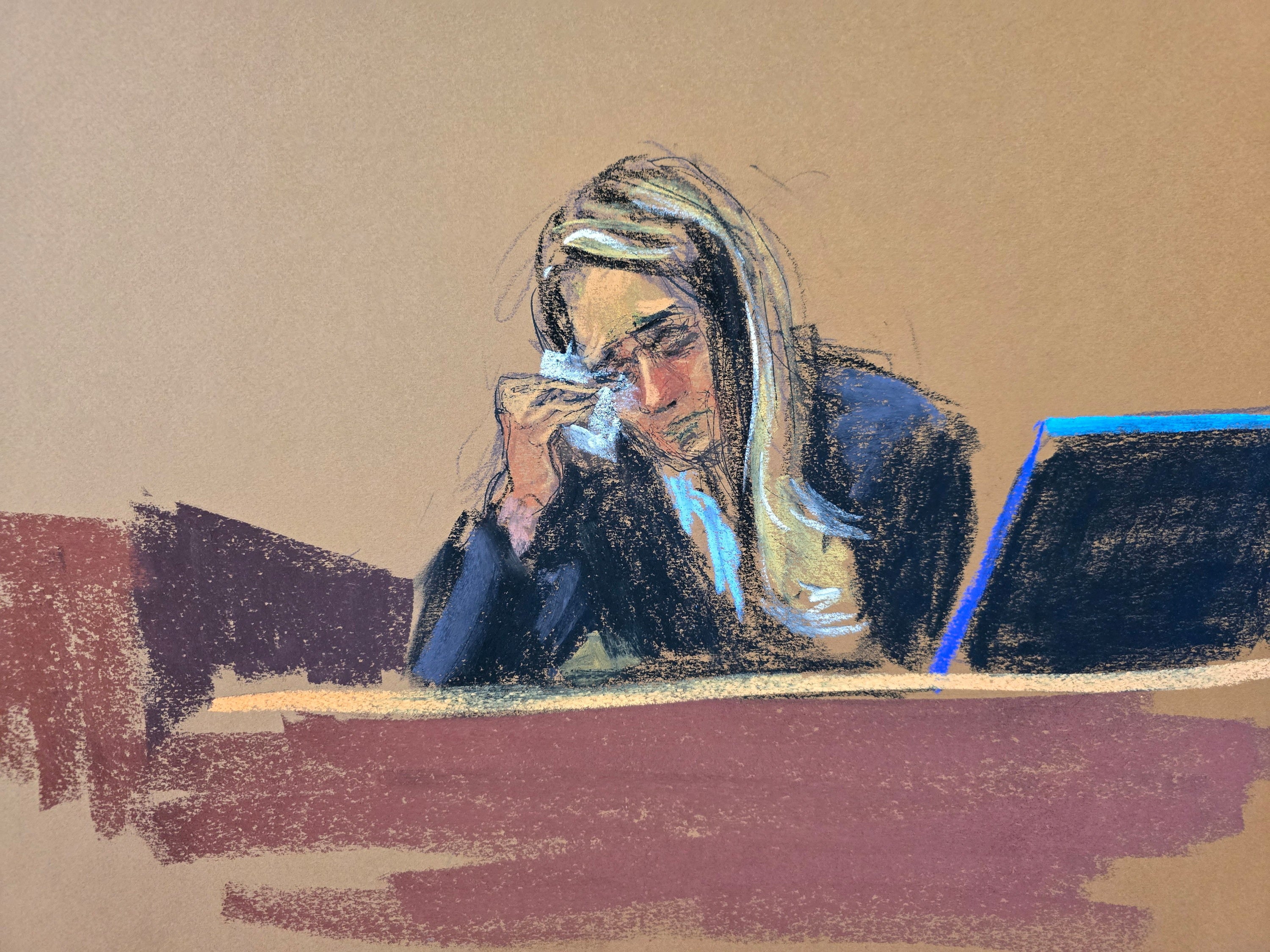 A courtroom sketch captures Hope Hicks isssuing a tissue to dab her eyes during Donald Trump’s criminal trial in Manhattan on 3 May.