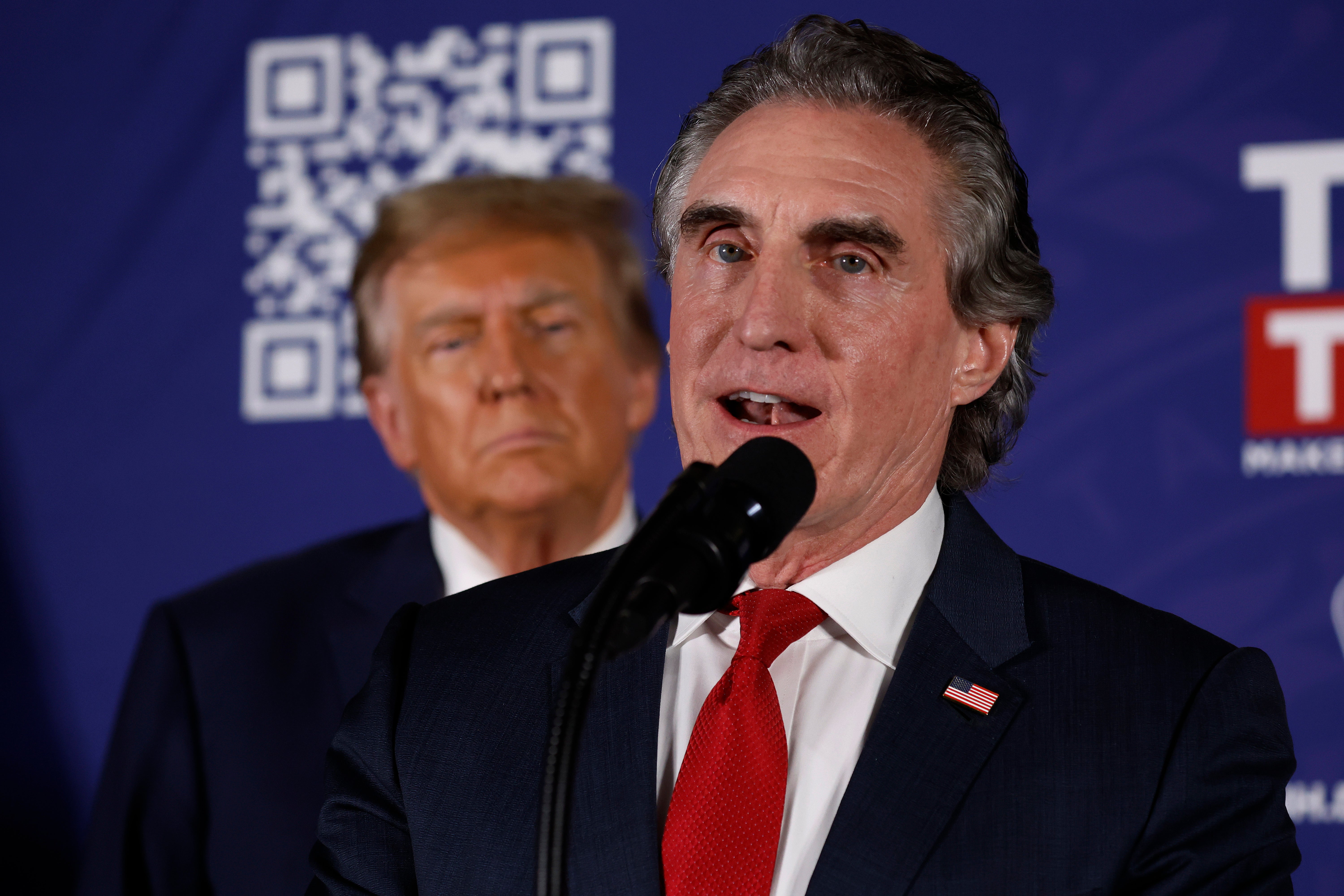 North Dakota Governor Doug Burgum encourages voters to support Republican presidential candidate and former President Donald Trump during a campaign rally in the basement ballroom of The Margate Resort on January 22, 2024 in Laconia, New Hampshire.