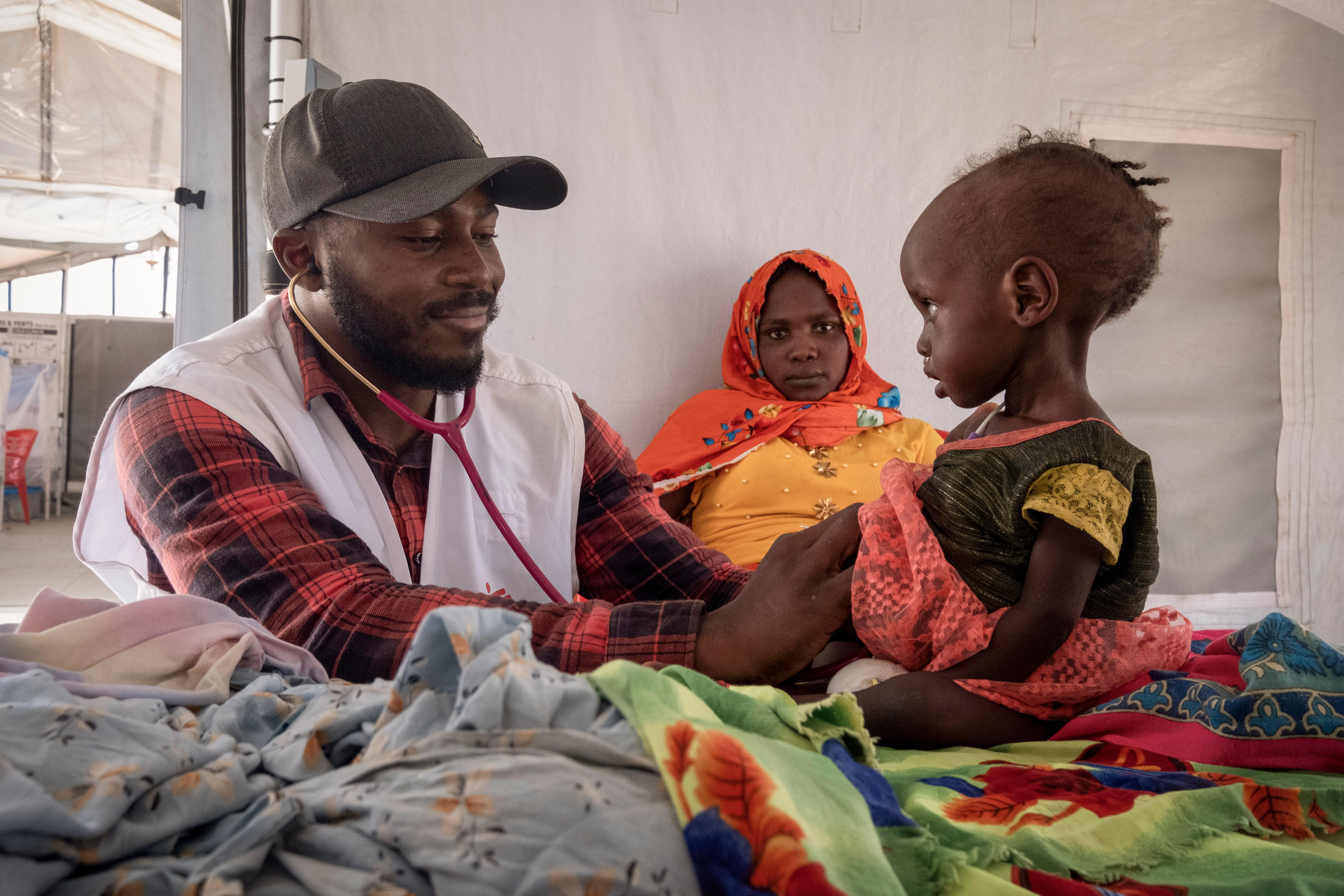 A Sudanese child is checked in an MSF clinic in Chad