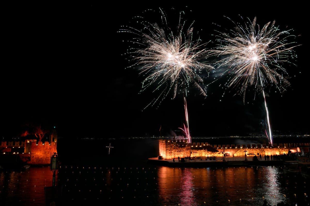 AP PHOTOS: Greek Orthodox mark Good Friday with solemn bier processions