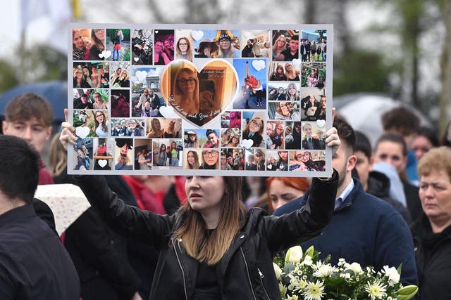 Mourners in Aughnacloy ahead of old Kamile Vaicikonyte’s funeral (Oliver McVeigh/PA)