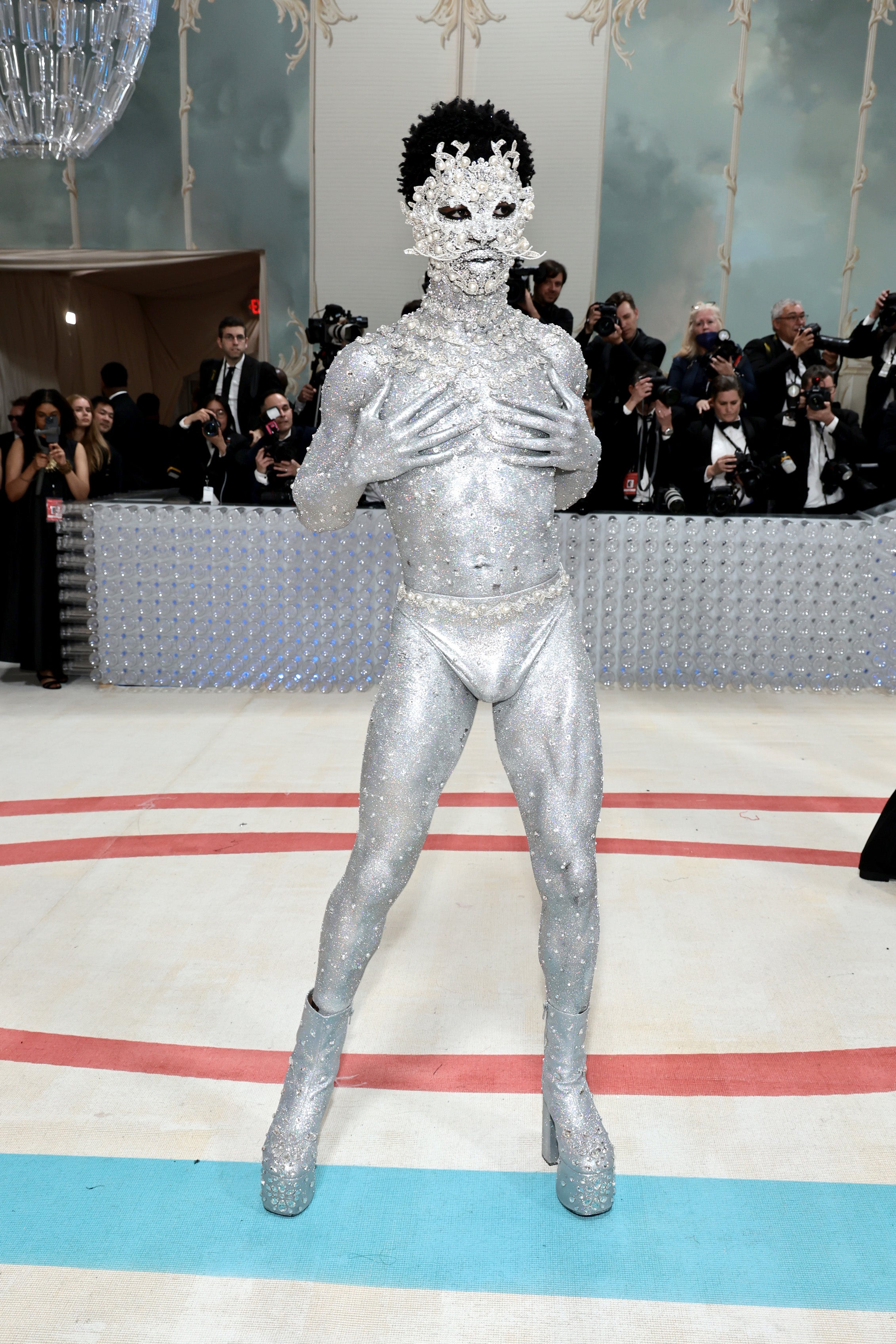 Lil Nas X showed up the 2023 Met Gala in nothing but silver underwear and metallic paint