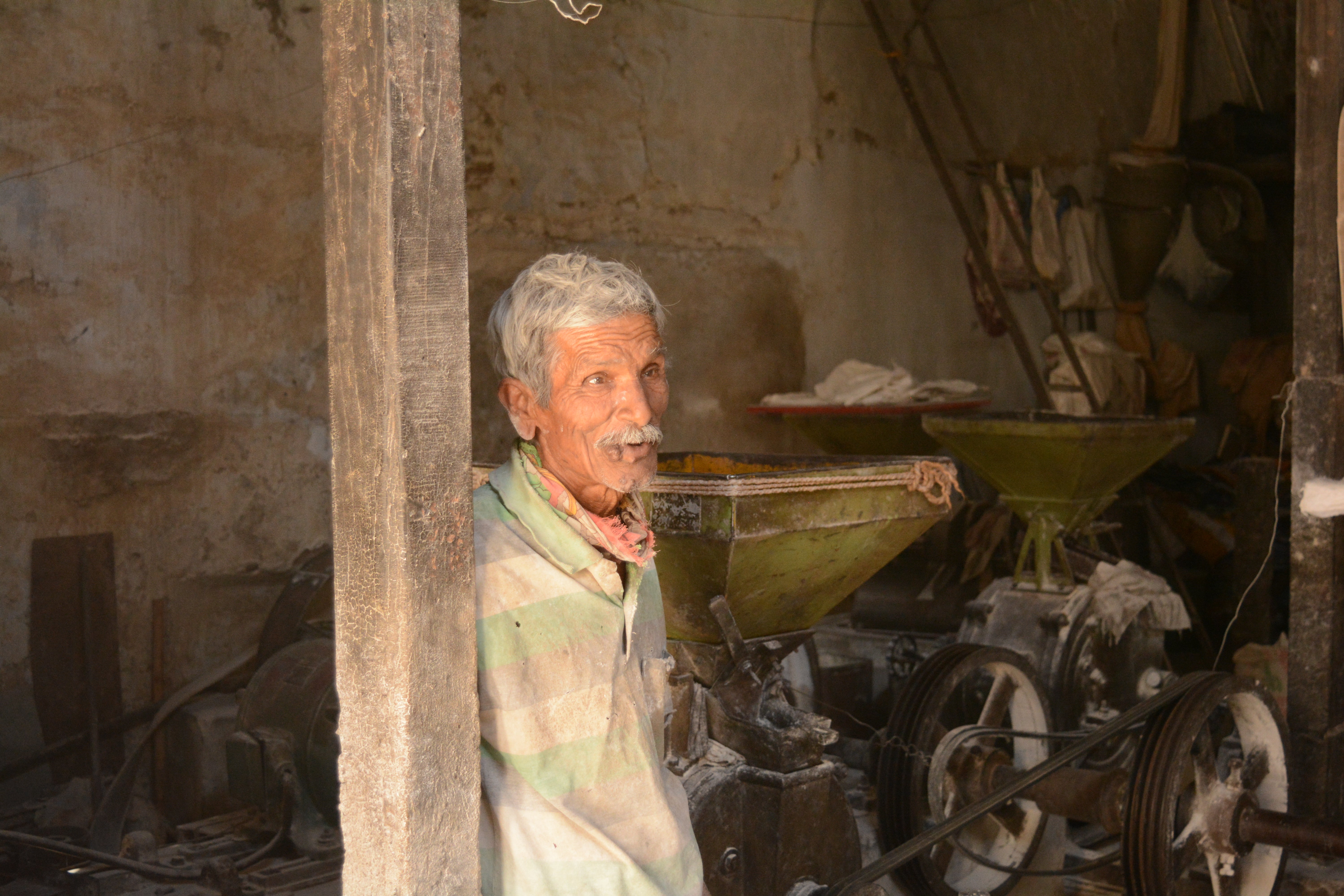Manakaji Darbar, pictured at the wheat flour mill in Vadnagar, is a star in his neighbourhood due to his childhood association with the prime minister