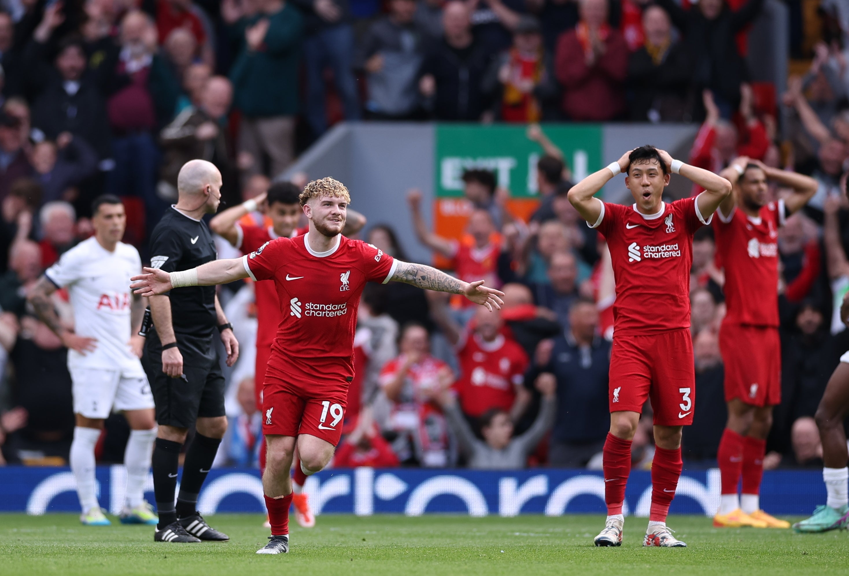 The Liverpool players are stunned by Harvey Elliott’s goal