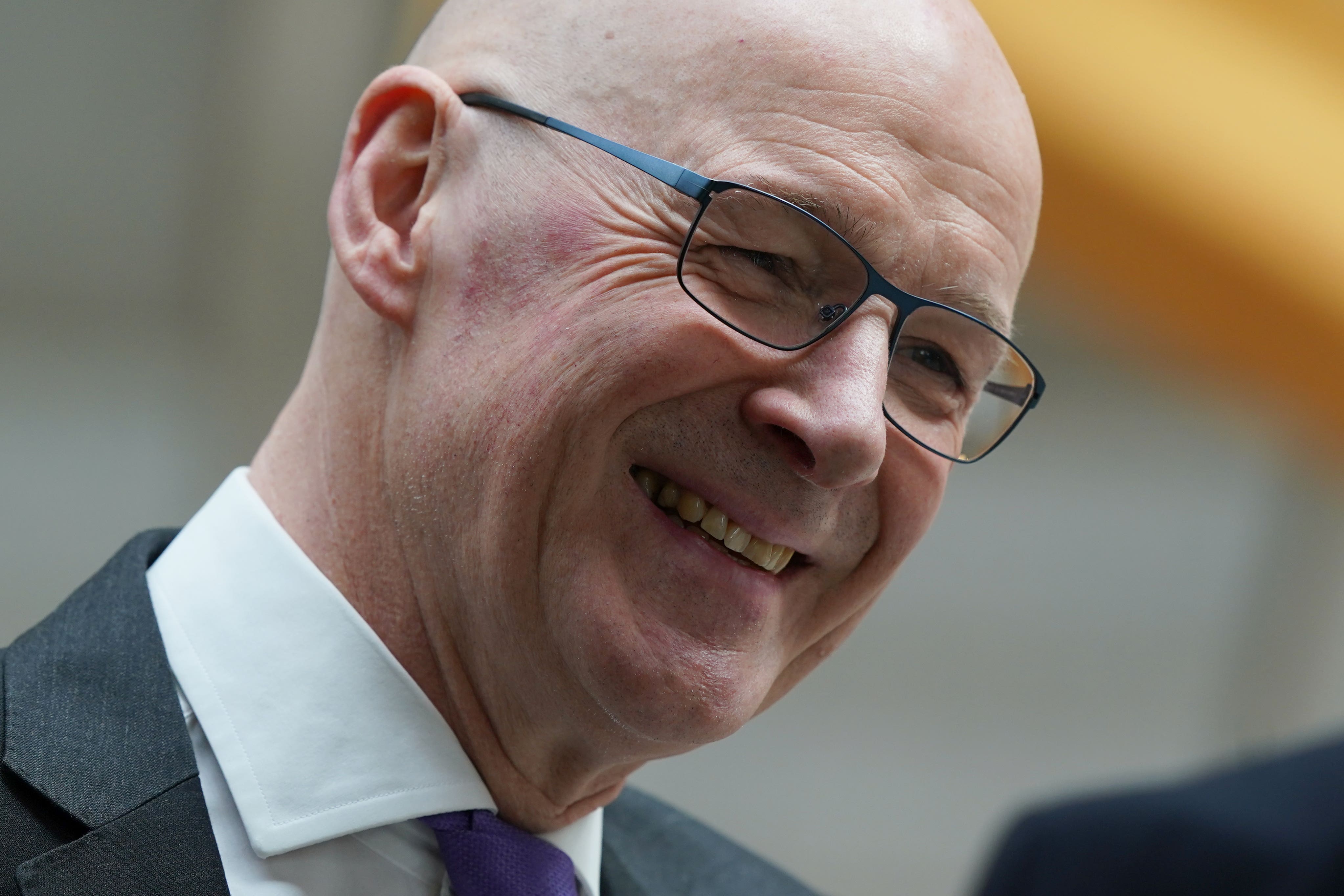 John Swinney has urged the next UK Government to work to ‘re-establish the purpose of devolution’ (Andrew Milligan/PA)