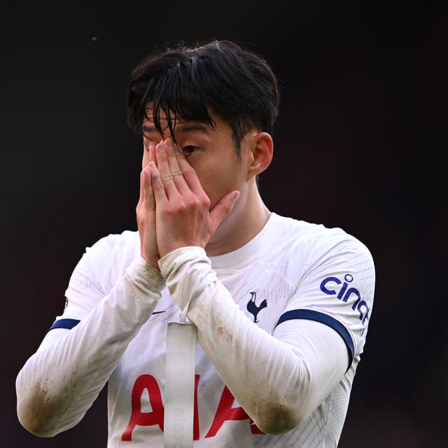 <p>Son Heung-Min of Tottenham Hotspur looks dejected against Liverpool</p>