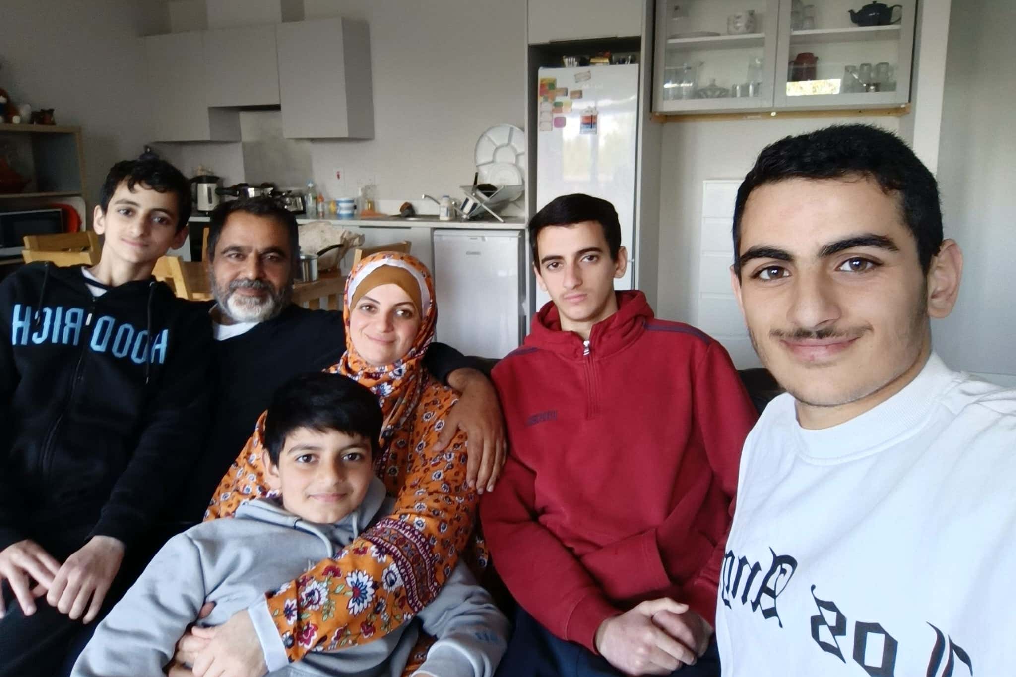 Zak Hania (second left) with his wife Batoul and their four children (Family handout/PA)