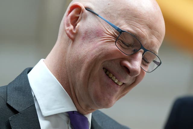 <p>Former Scottish deputy first minister John Swinney said he was ‘deeply honoured’ to be the new leader of the SNP (Andrew Milligan/PA)</p>
