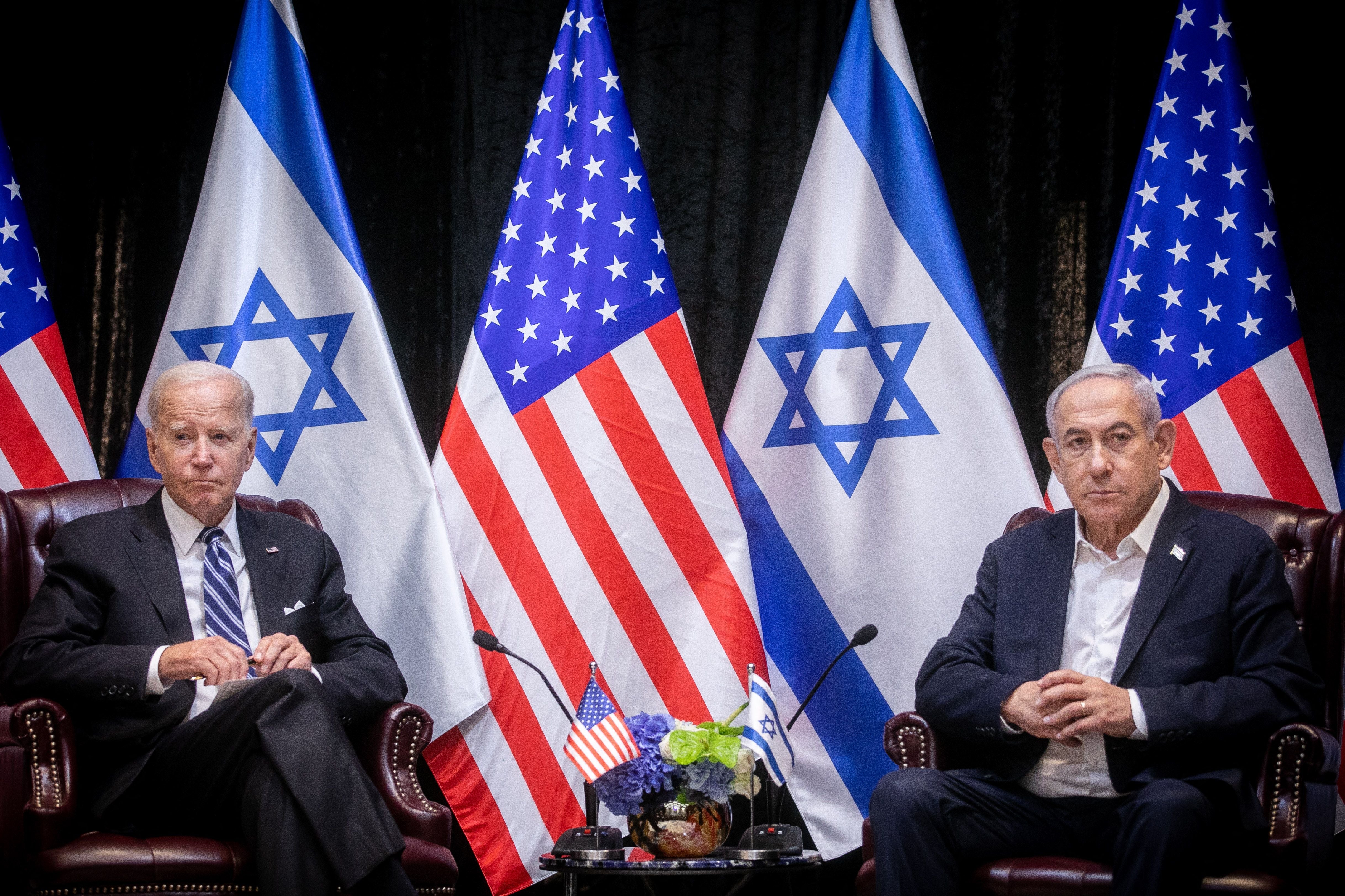 President Joe Biden, sits with Israeli prime minister Benjamin Netanyahu, at the start of the Israeli war cabinet meeting in October last year