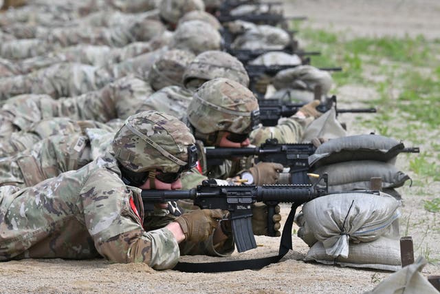 <p>US soldiers aim rifles at a shooting range at Camp Casey on May 1, 2024. A US soldier has been detained in Russia on accusations of stealing, a report said on Monday </p>