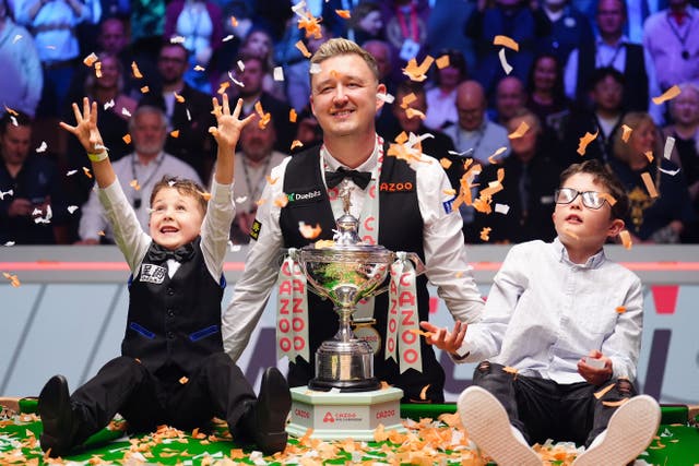 Kyren Wilson celebrated his first world title with his two young sons (Mike Egerton/PA)