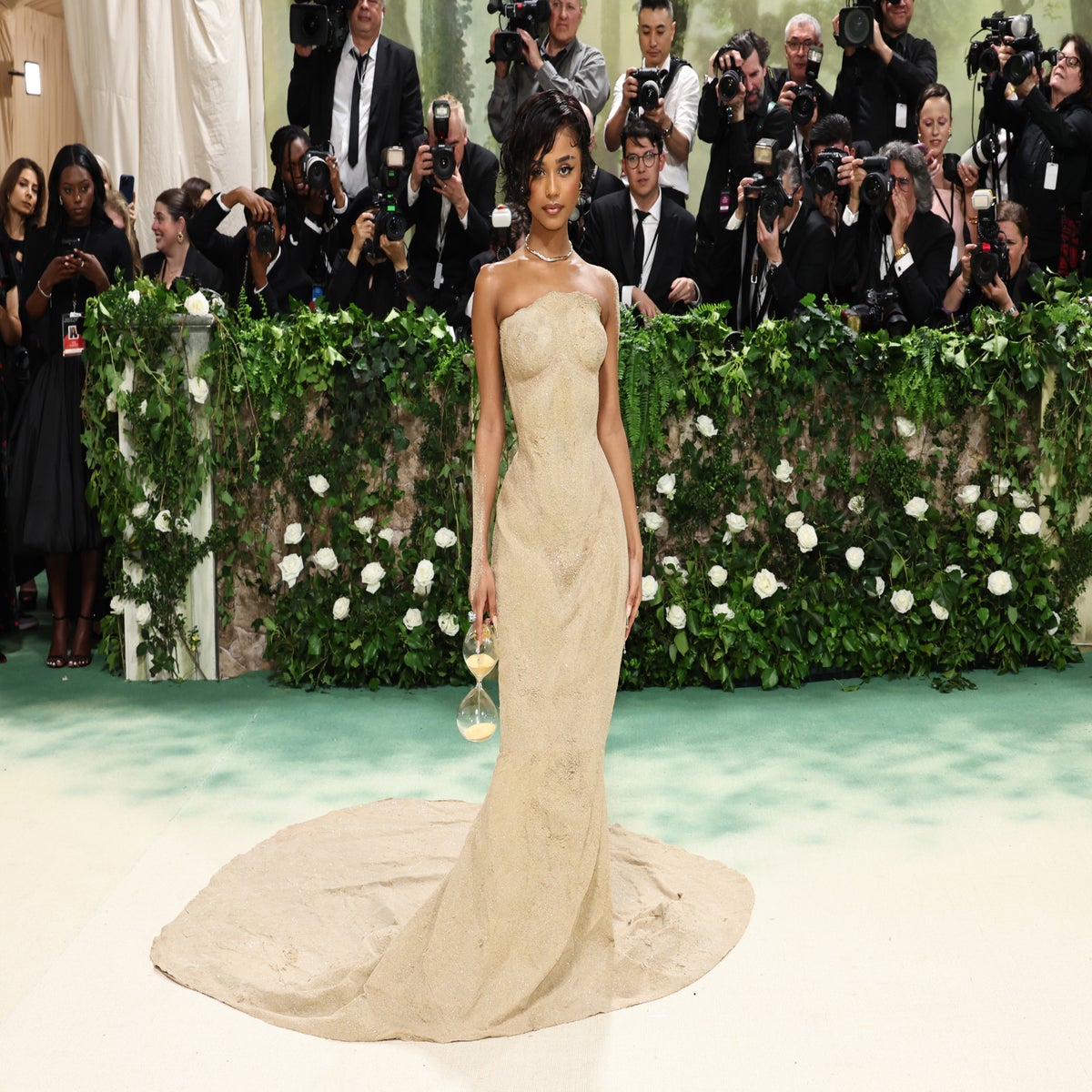 Watch: Singer Tyla gets carried up Met Gala steps in tight sand dress |  Lifestyle | Independent TV