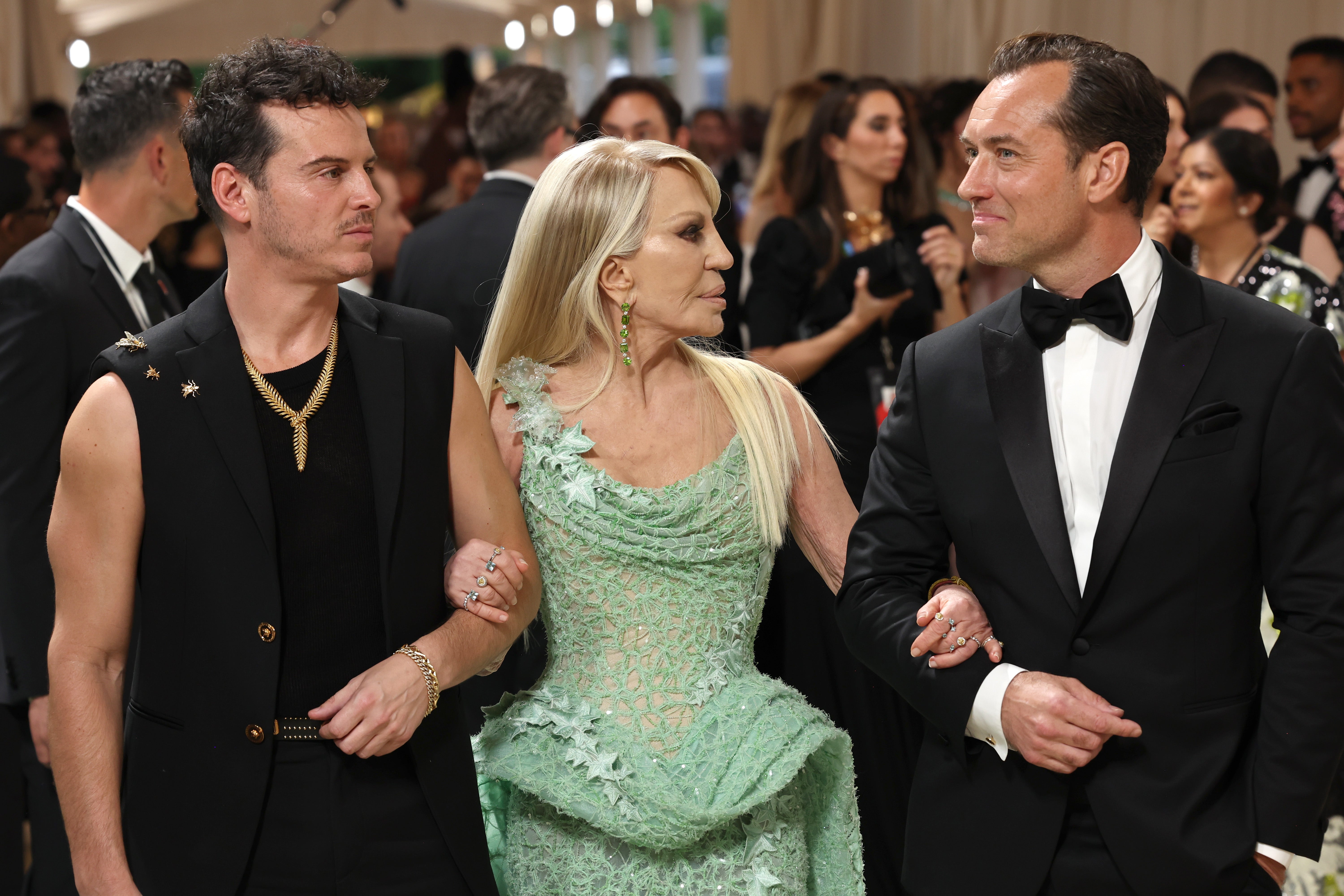 Law and Scott were joined by Donatella Versace