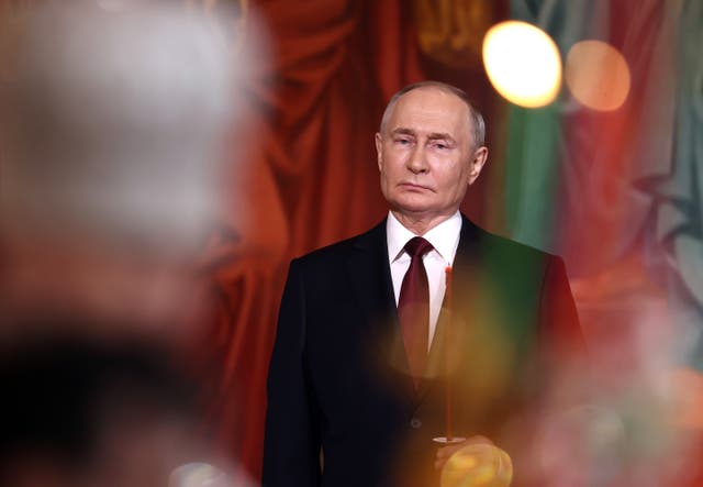 <p>Vladimir Putin attends the Orthodox Easter service at the Cathedral of Christ the Saviour in Moscow</p>