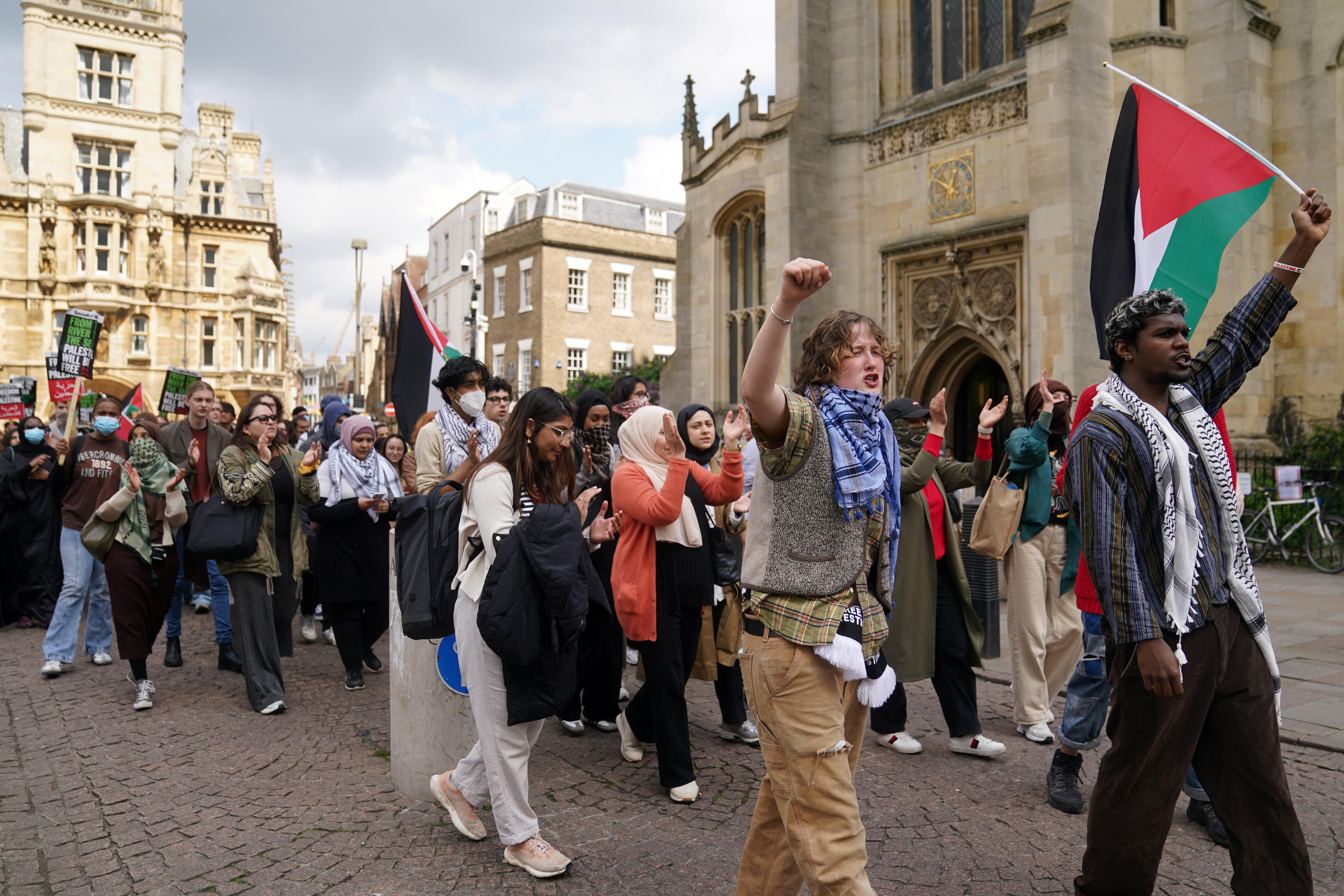 Students march to deliver their demands to Cambridge University as they protest against the war in Gaza