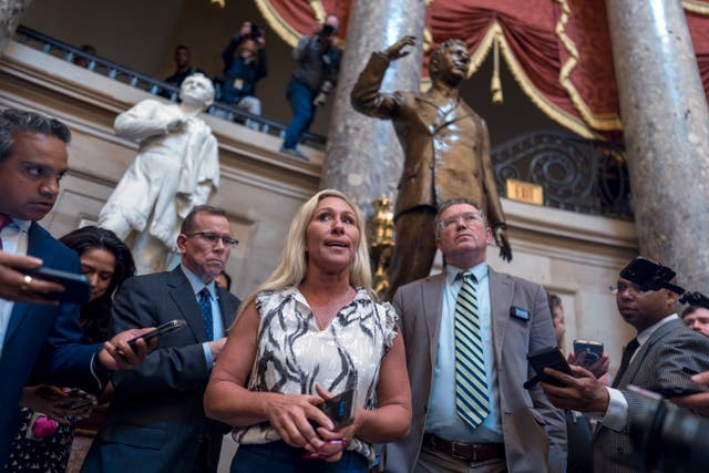 <p>Marjorie Taylor Greene and Thomas Massie speak to reporters after meeting with Speaker Mike Johnson on 6 May 2024. Ms Greene filed a motion to vacate Mr Johnson on Wednesday </p>
