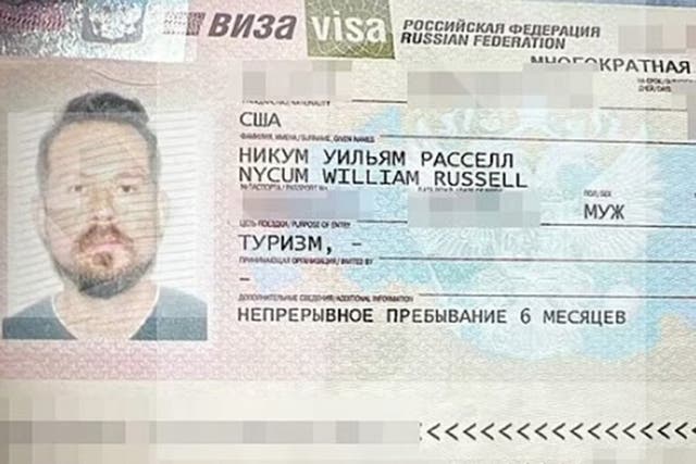 <p>William Russell Nycum, pictured on his Russian tourist visa. He reportedly fell asleep while intoxicated in a children’s library in Moscow</p>