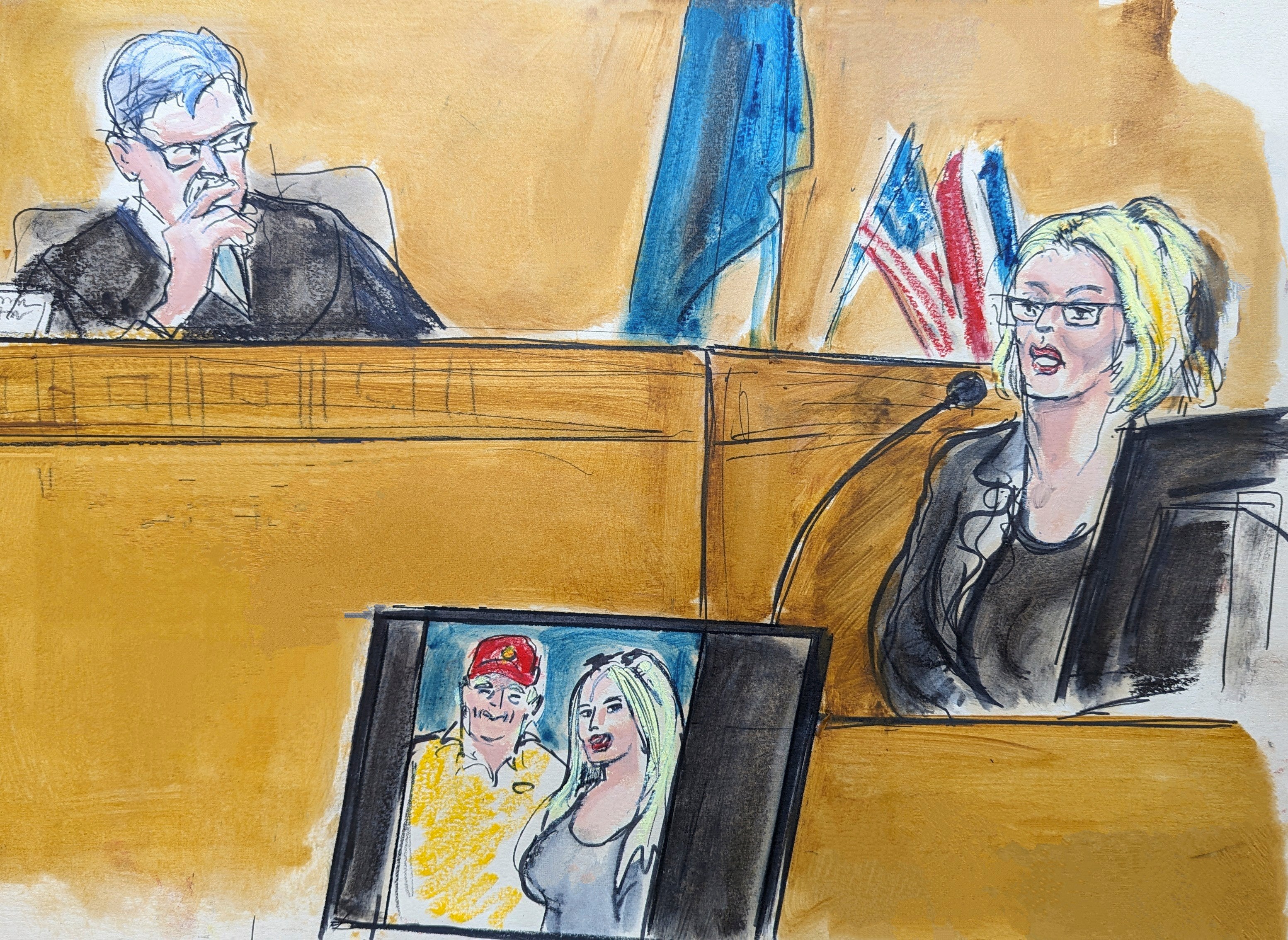 In this courtroom sketch, Stormy Daniels testifies on the witness stand as Judge Juan Merchan looks on in Manhattan criminal court on 7 May 2024