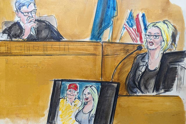 <p>In this courtroom sketch, Stormy Daniels testifies on the witness stand as Judge Juan Merchan looks on in Manhattan criminal court on 7 May 2024</p>