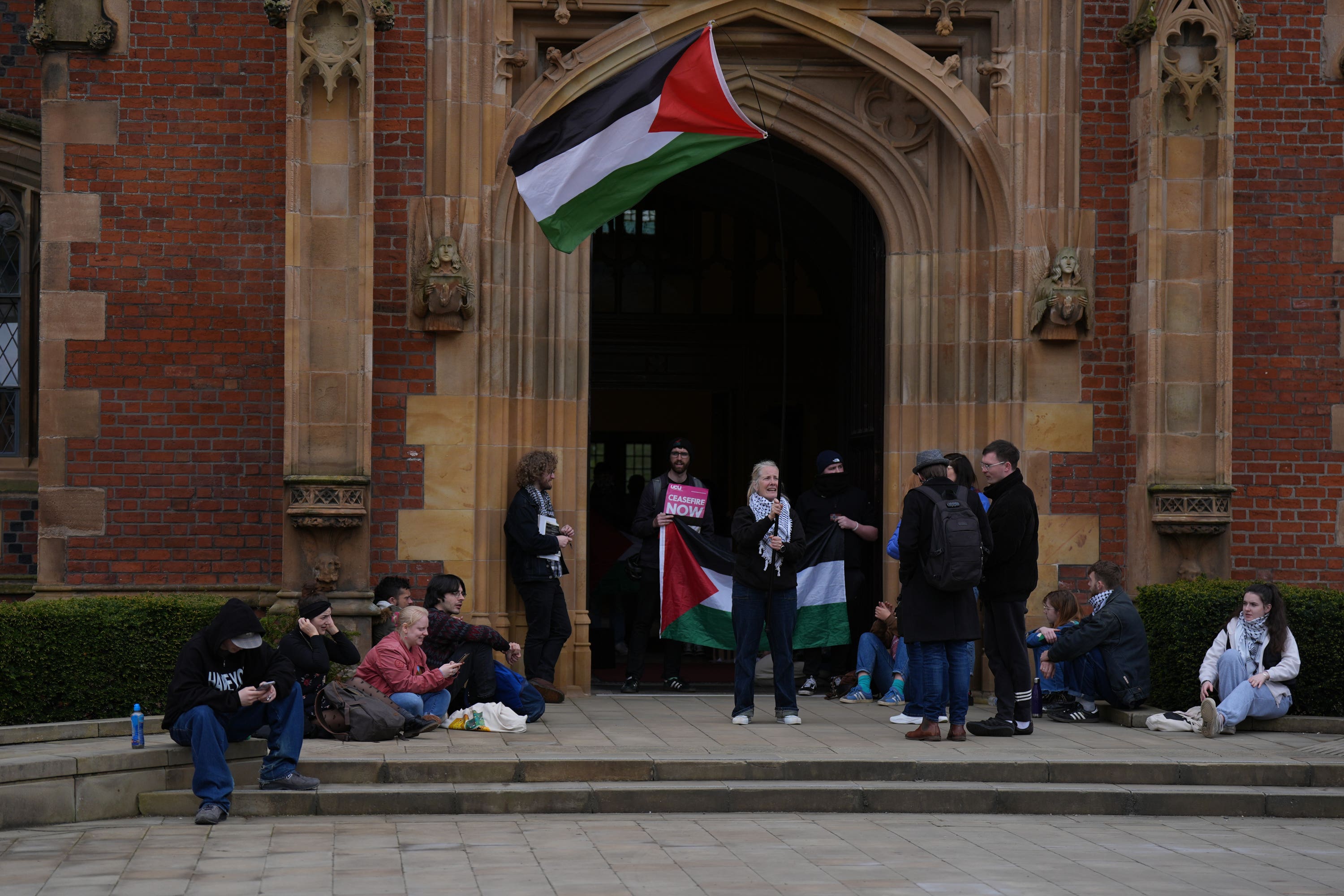 Members of the Queen’s University Belfast Palestine Assembly hold a ‘sit in’ (Niall Carson/PA)