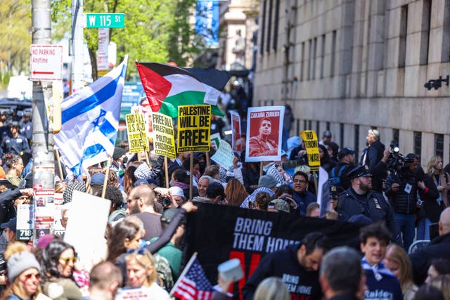 <p>Pro-Palestinian and Pro-israel face off in front of the entrance of Columbia University which is occupied by Pro-Palestinian protesters in New York on April 22, 2024. </p>