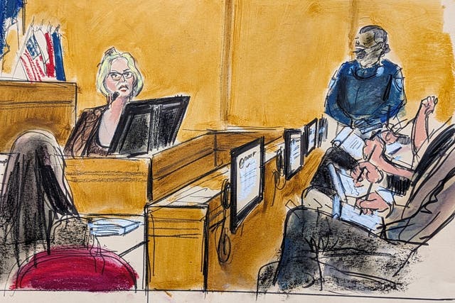 <p>Jurors take notes as Stormy Daniels testifies against Donald Trump in Manhattan criminal court on 7 May 2024</p>