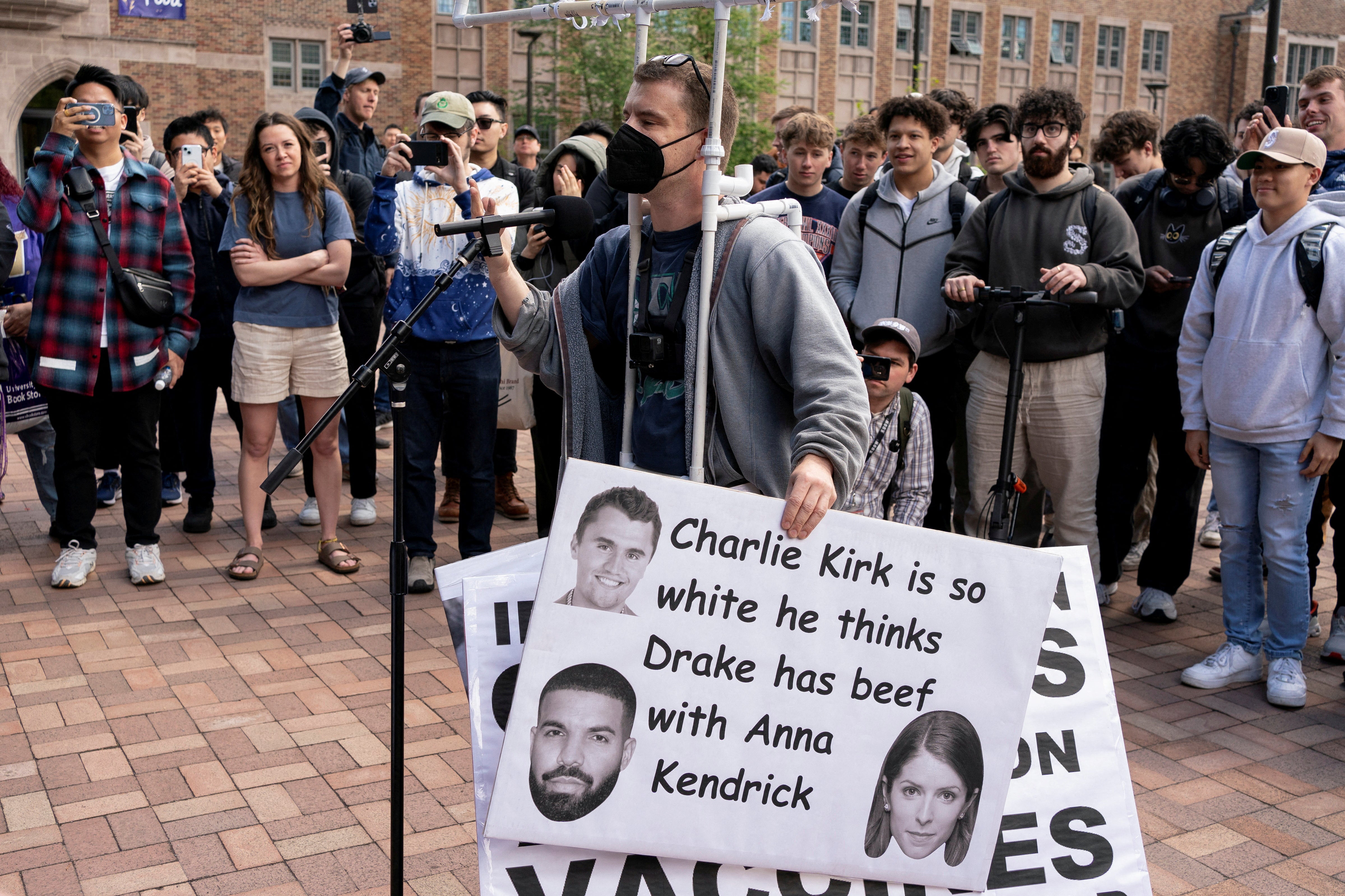 A person argues with Turning Point USA founder and conservative commentator Charlie Kirk during a debate event ahead of his scheduled speech on campus of the University of Washington near a protest encampment in support of Palestinians, during the ongoing conflict between Israel and the Palestinian Islamist group Hamas, in Seattle, Washington, US 7 May 2024