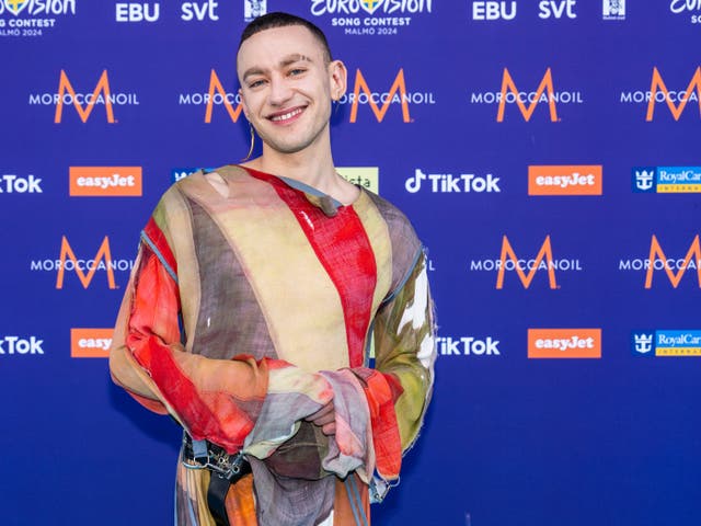 <p>Olly Alexander on the turquoise carpet at the 68th Eurovision Song Contest in Malmo, Sweden</p>