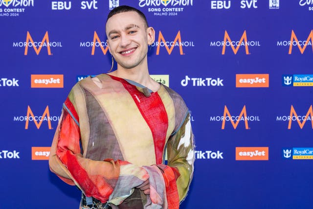 <p>Olly Alexander on the turquoise carpet at the 68th Eurovision Song Contest in Malmo, Sweden</p>